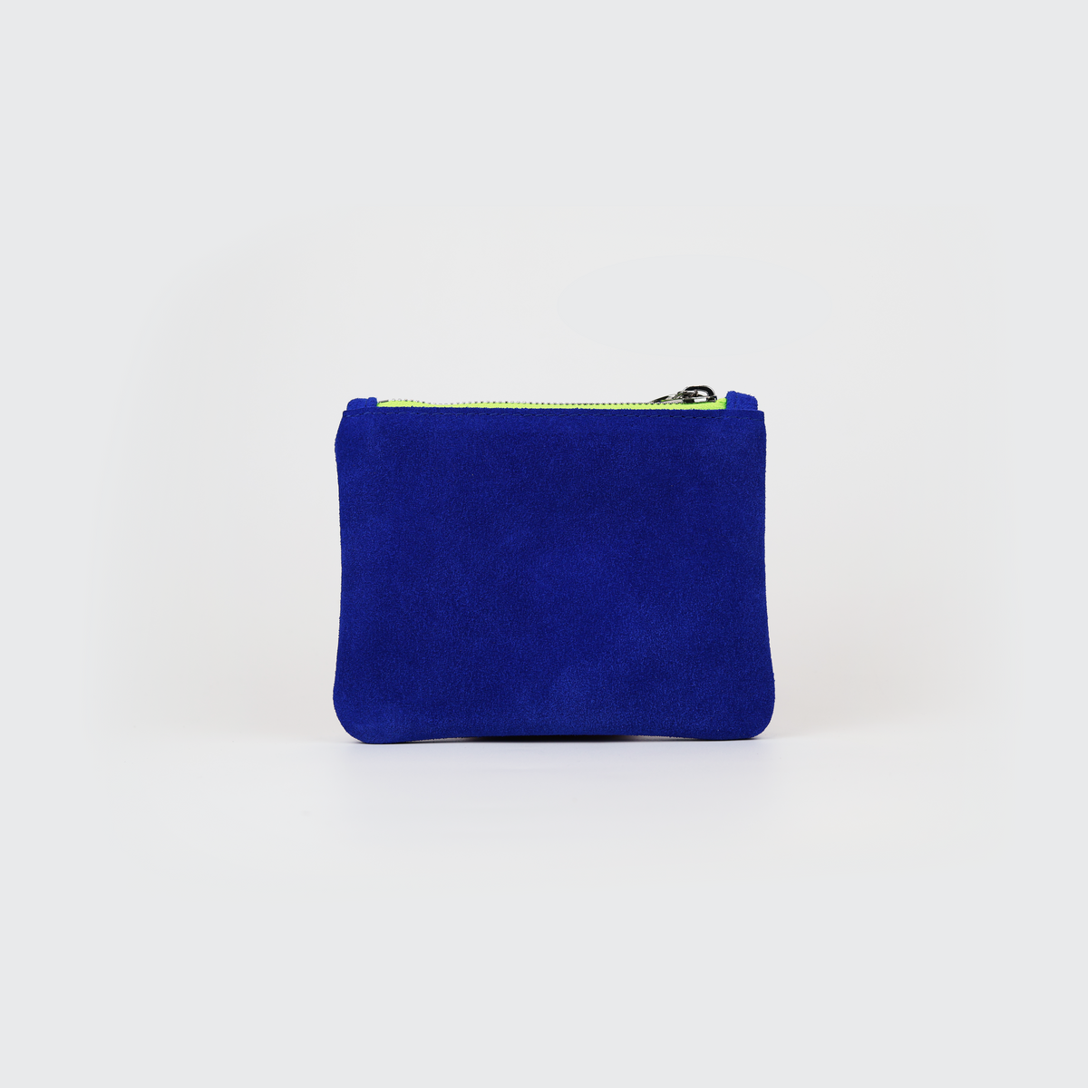 Royal blue suede coin pouch with acid lime zipper tape and silver zipper