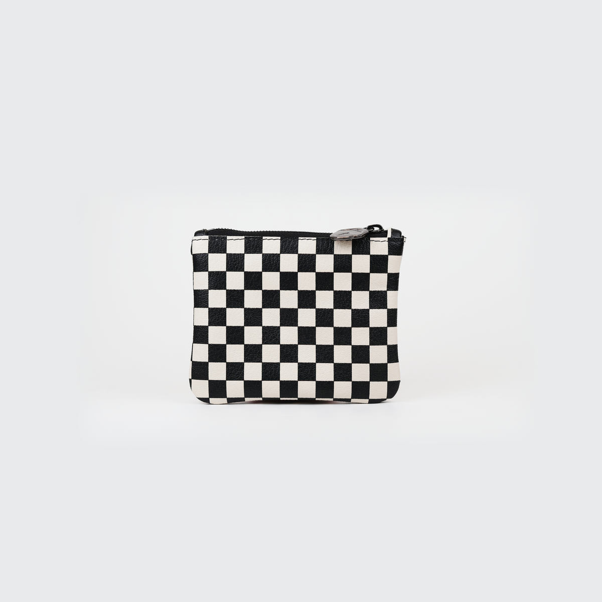 Black and cream checkered leather coin pouch with black zipper