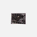Dark Brown leather crocodile-patterned clutch bag on a light gray background