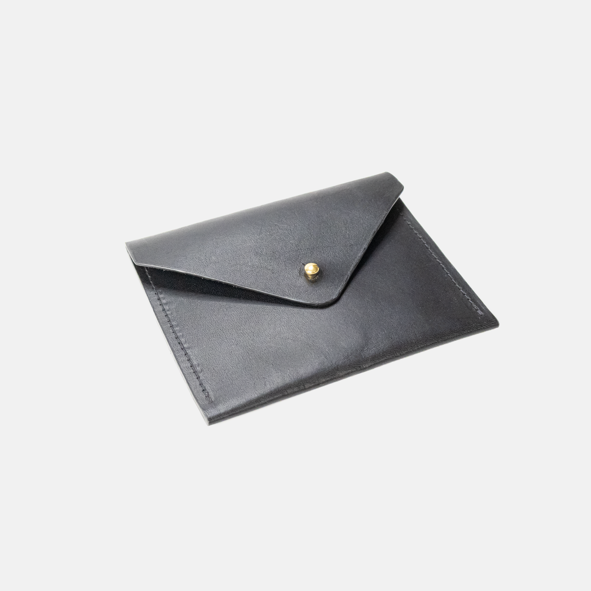 Black leather envelope with a gold clasp on a light gray background