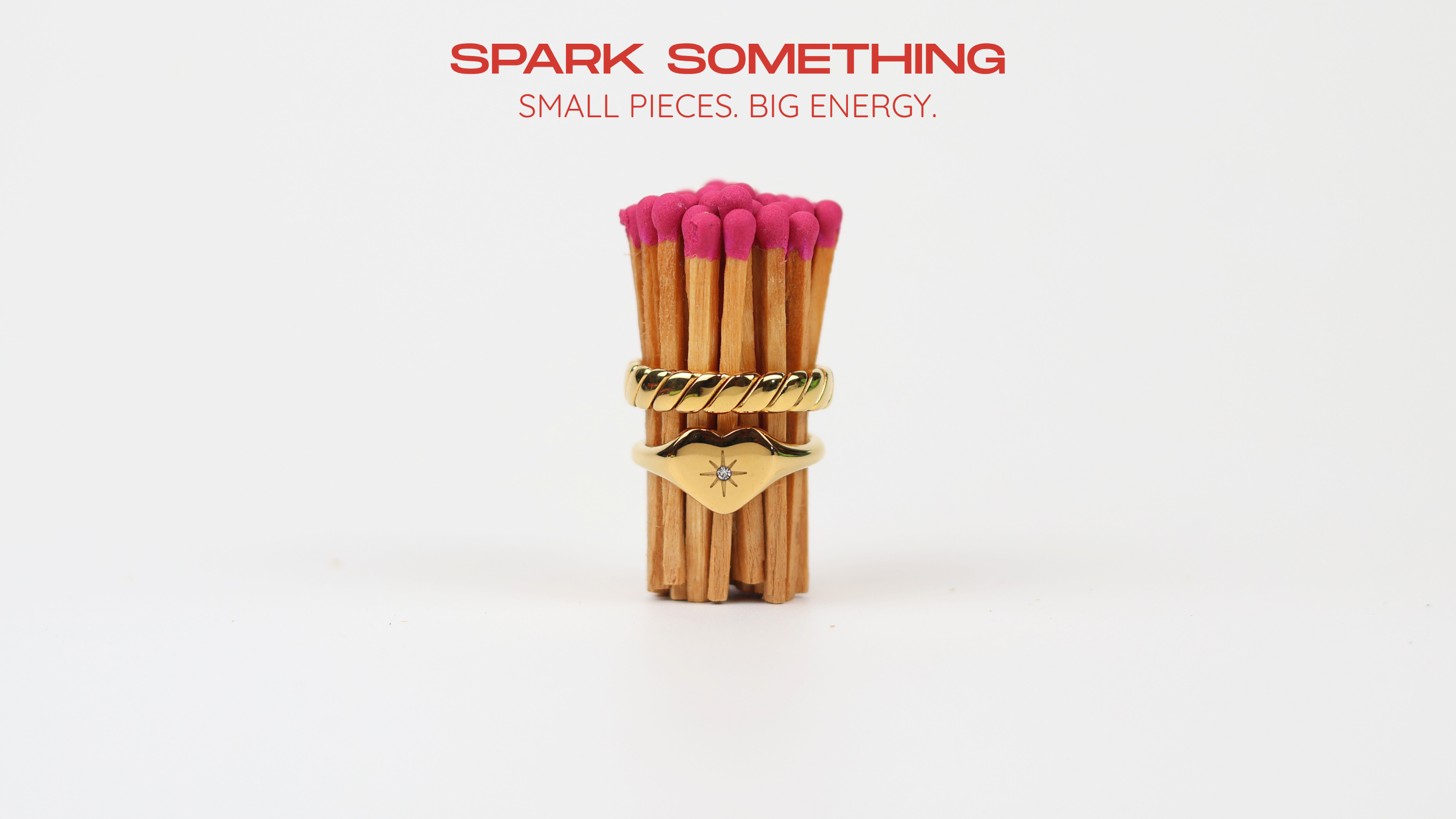 Stacked-rings-on-pink-unlit-matches